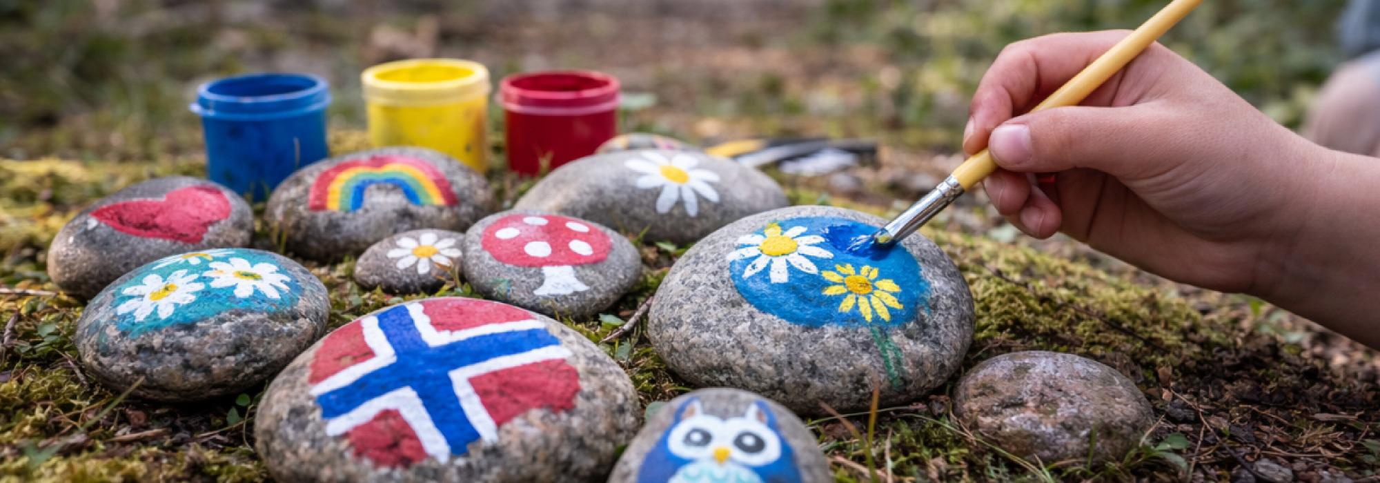 Kveldsmattur og Bålkos med Kreativ Steinmaling på Oksenøya Bruk for barnefamilier