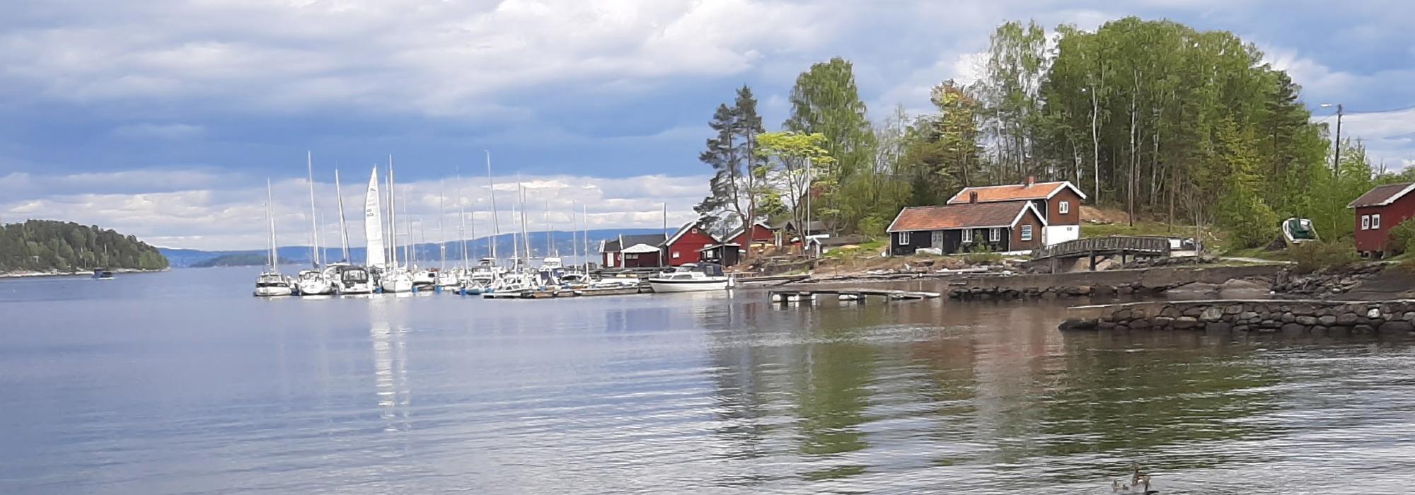 Østenstad. Fra åker og eng til sjø og båtliv.
